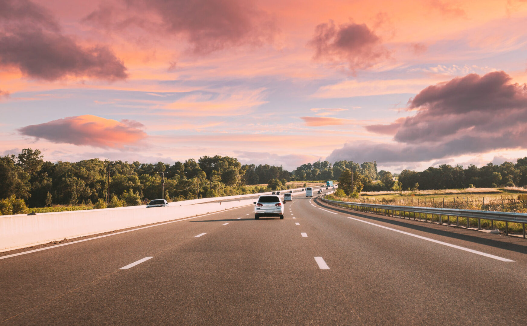 movement of vehicles on highway during sunset time