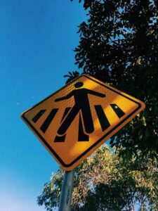 Walking safety signage reminding Polk County residents of pedestrian safety tips